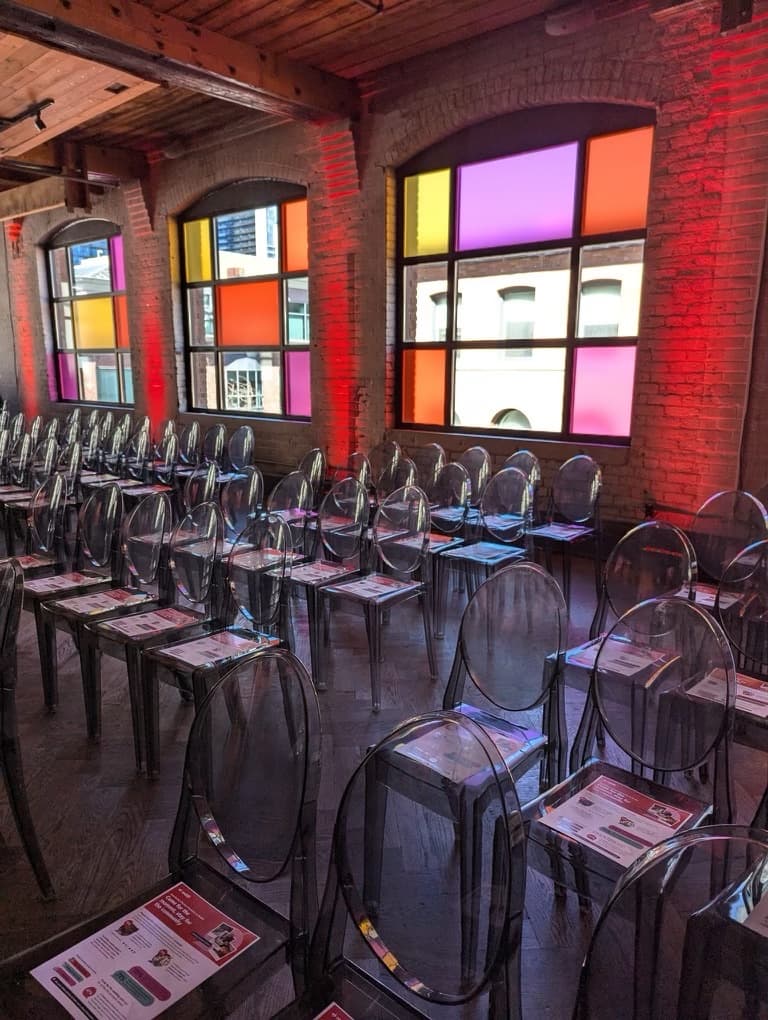 Theatre-style seating set for a presentation at Storys