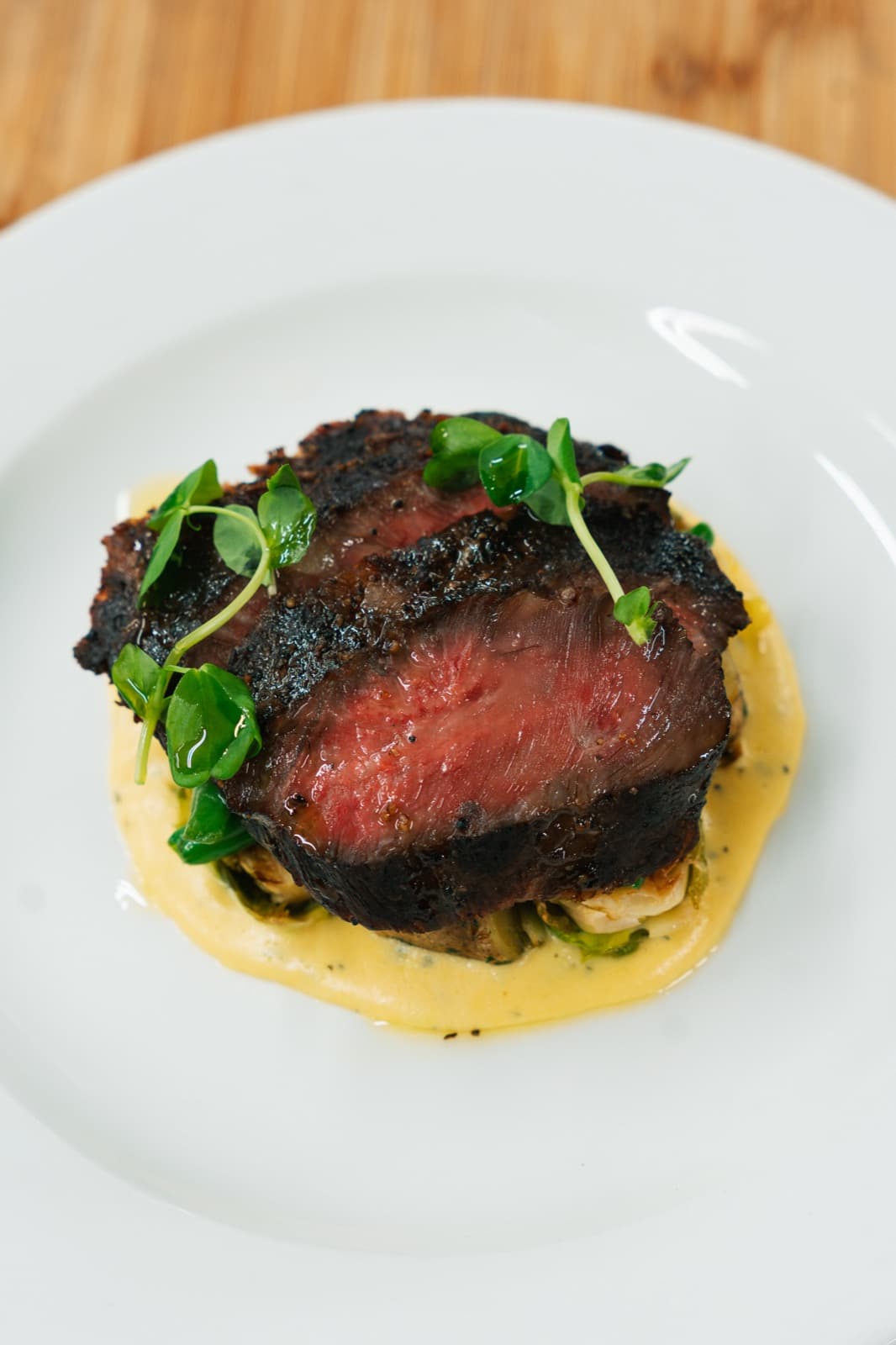 Seared steak plated by the Storys culinary team
