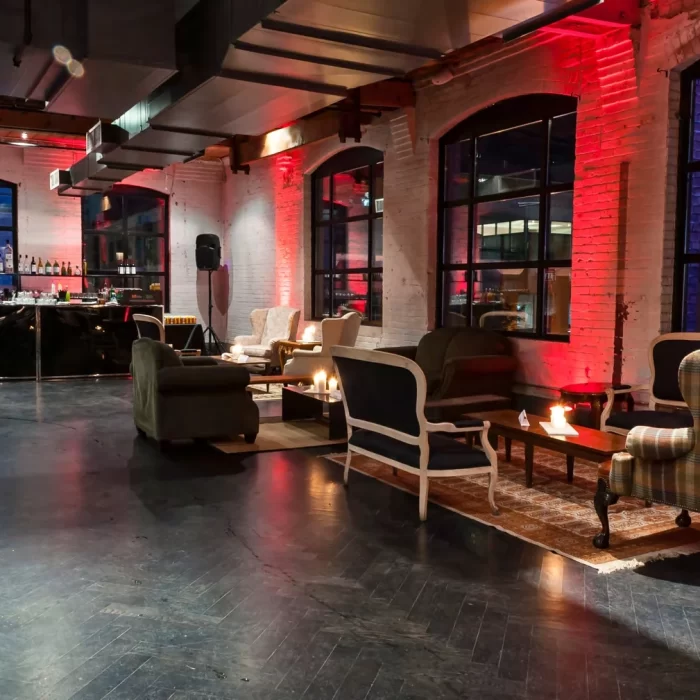 Modern lounge bar setup with ambient lighting for corporate events and social gatherings